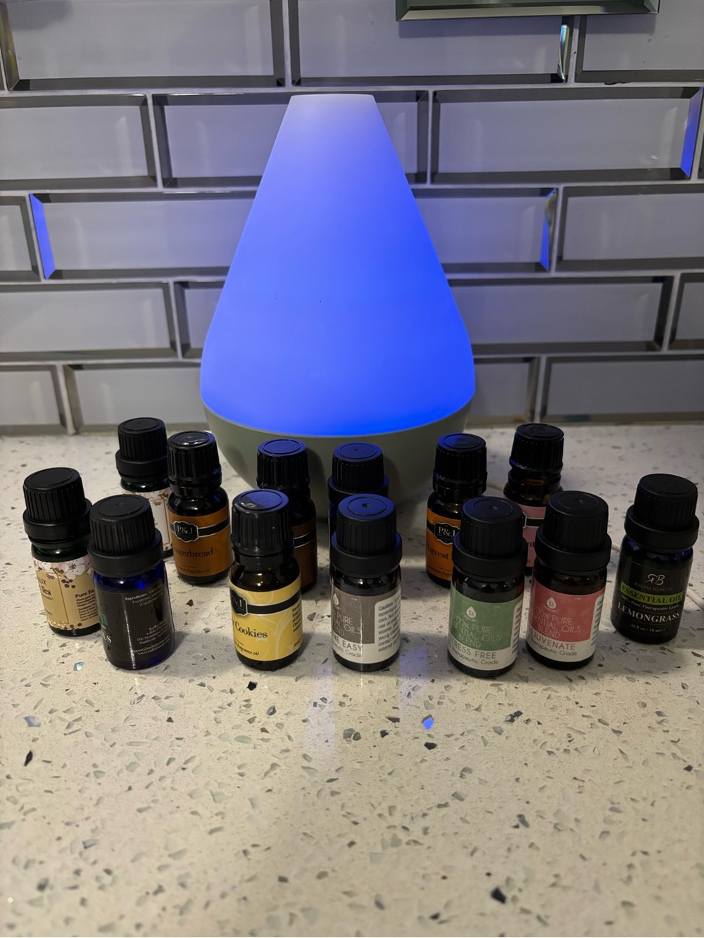 Young Living Essential Oil Diffuser with Assorted Essential Oil Bottles